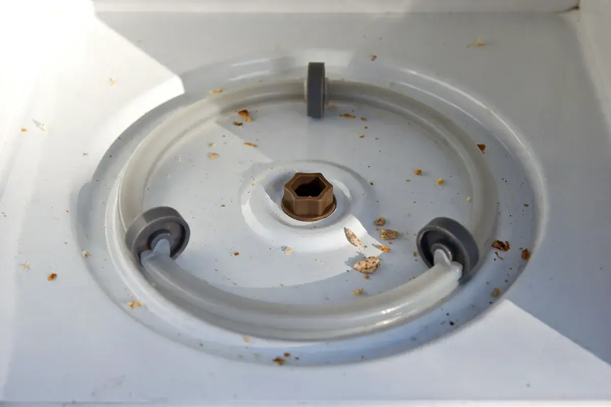Microwave roller ring and center hub with residue in the track
